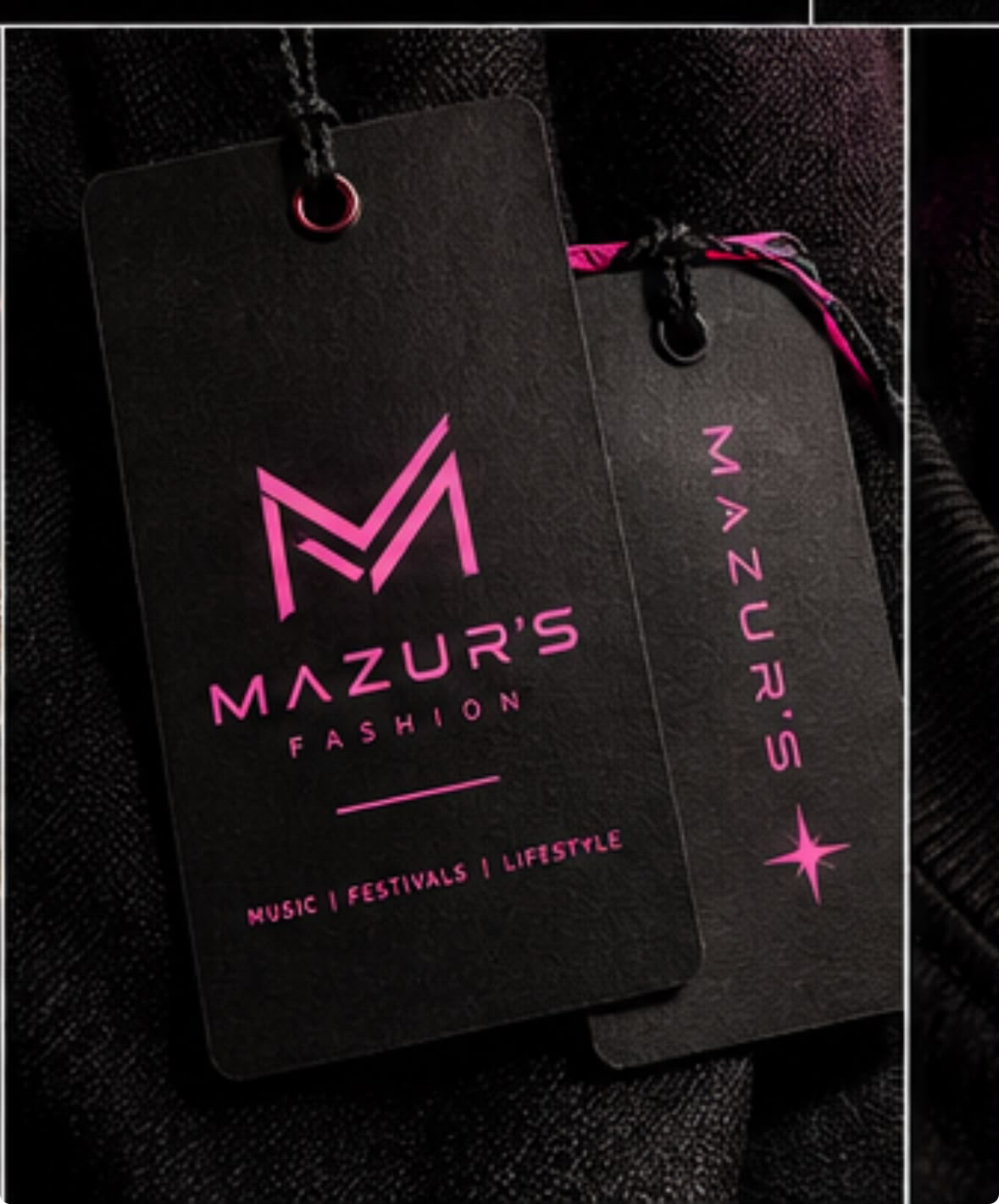 Referência da marca MAZUR'S Fashion em etiquetas pretas com símbolo e letras rosa